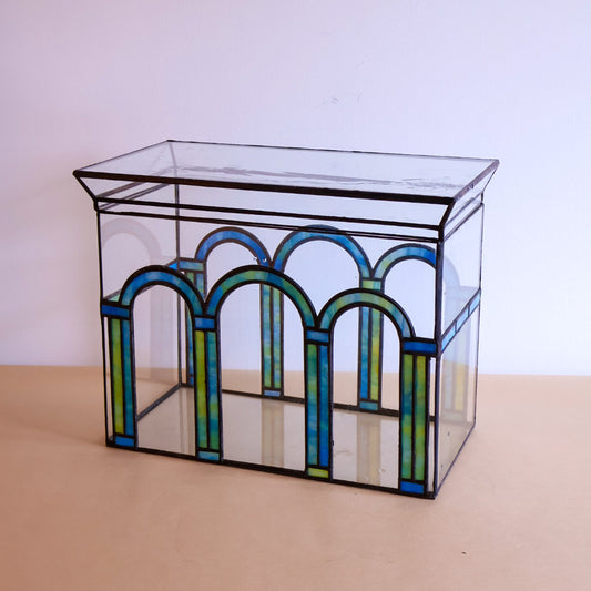 Six arch design with blue/green glass